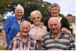 Residents smiling together in the garden